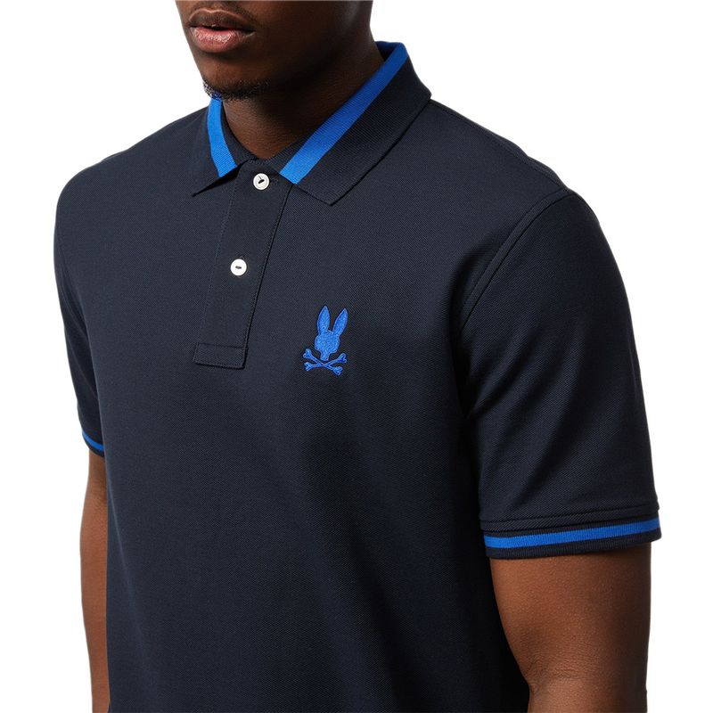 Polo de manga corta azul marino con estampado fantasía